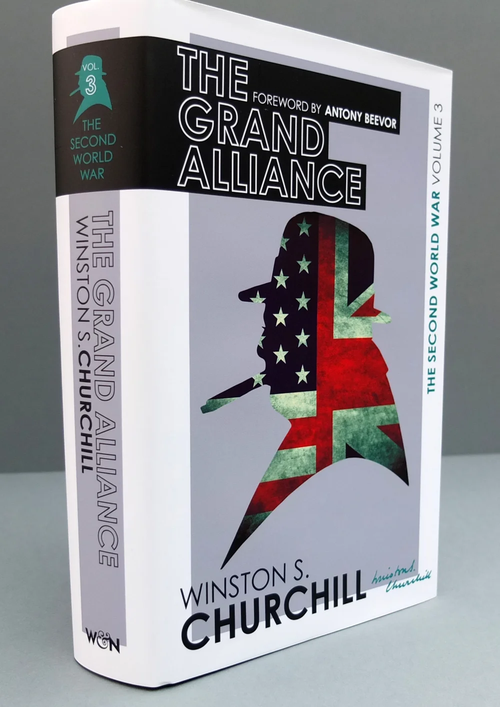 Hardback copy of The Grand Alliance, Volume 3, standing upright — the Churchill silhouette filled with interwoven US and UK flags